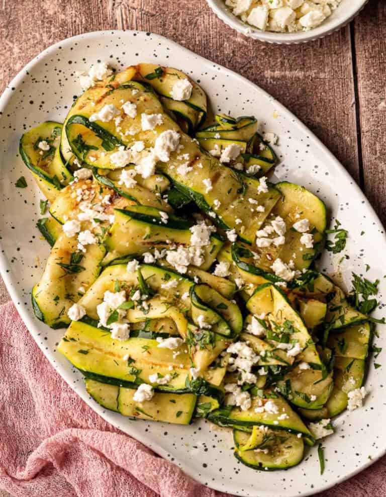 Grilled Zucchini Salad in White Bowl on Wooden Surface