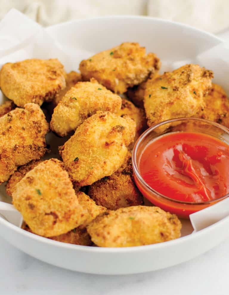 Air Fried Chicken Nuggets in White Dish with Ketchup