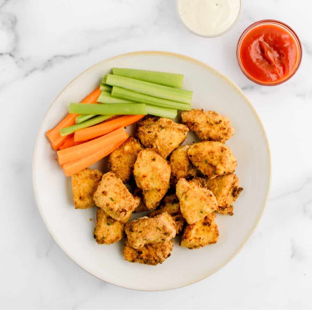 Plated Chicken Nuggets with Carrot and Celery Sticks