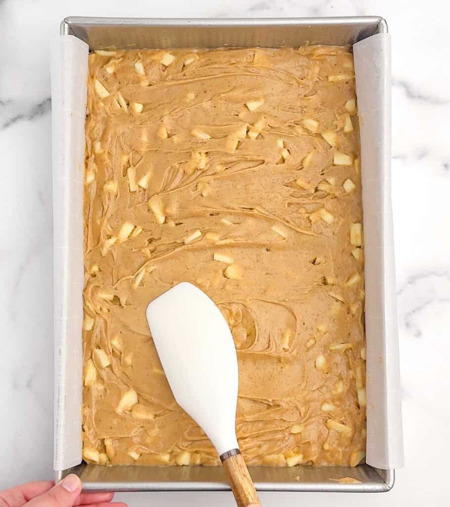 Spreading Blondie Batter Into Metal Pan with Parchment