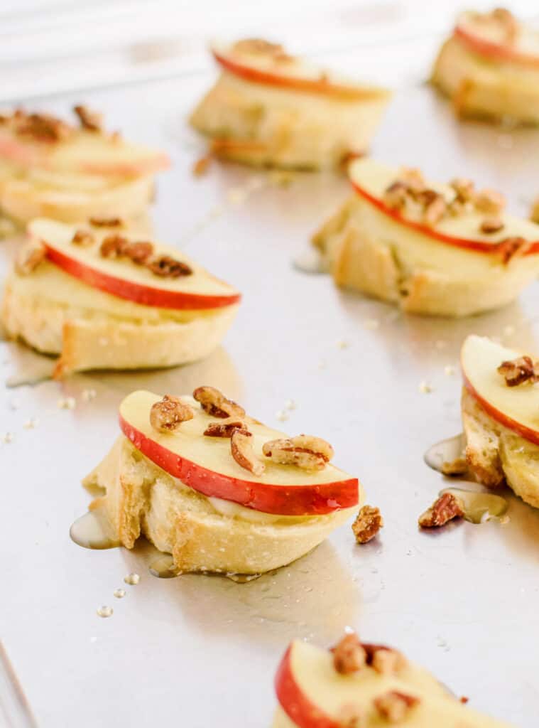 Brie, Apple, Honey Crostini on Parchment Paper
