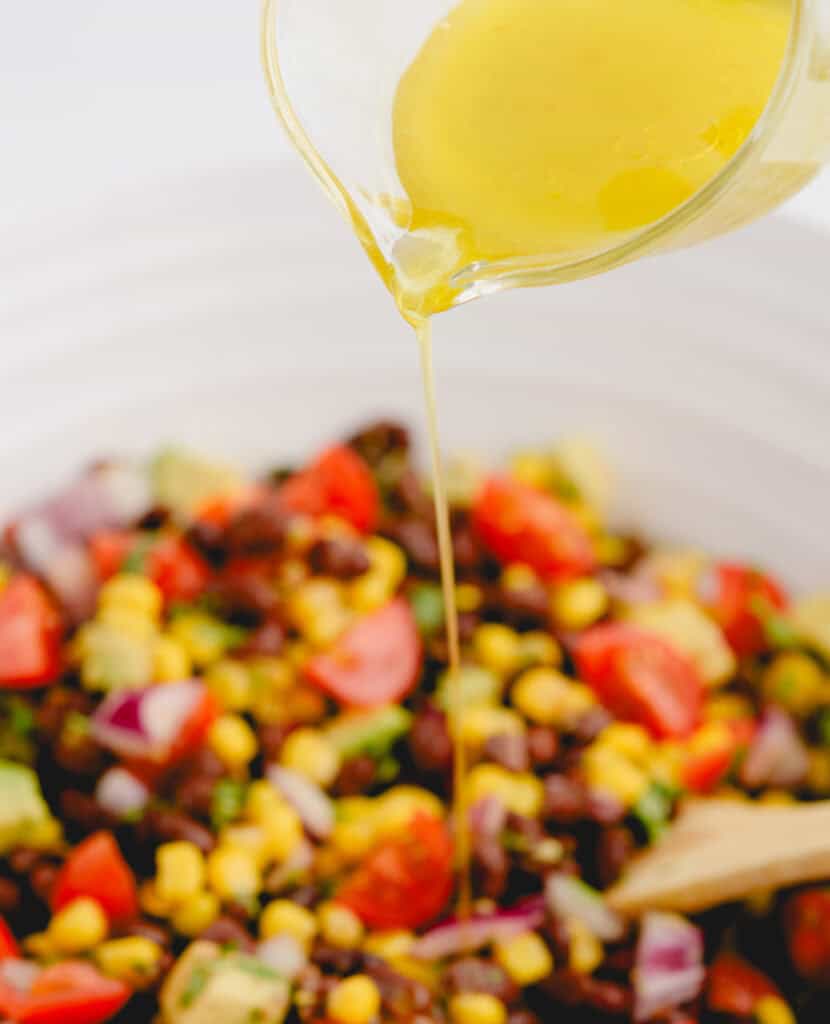 Adding Dressing to Black Bean Salad