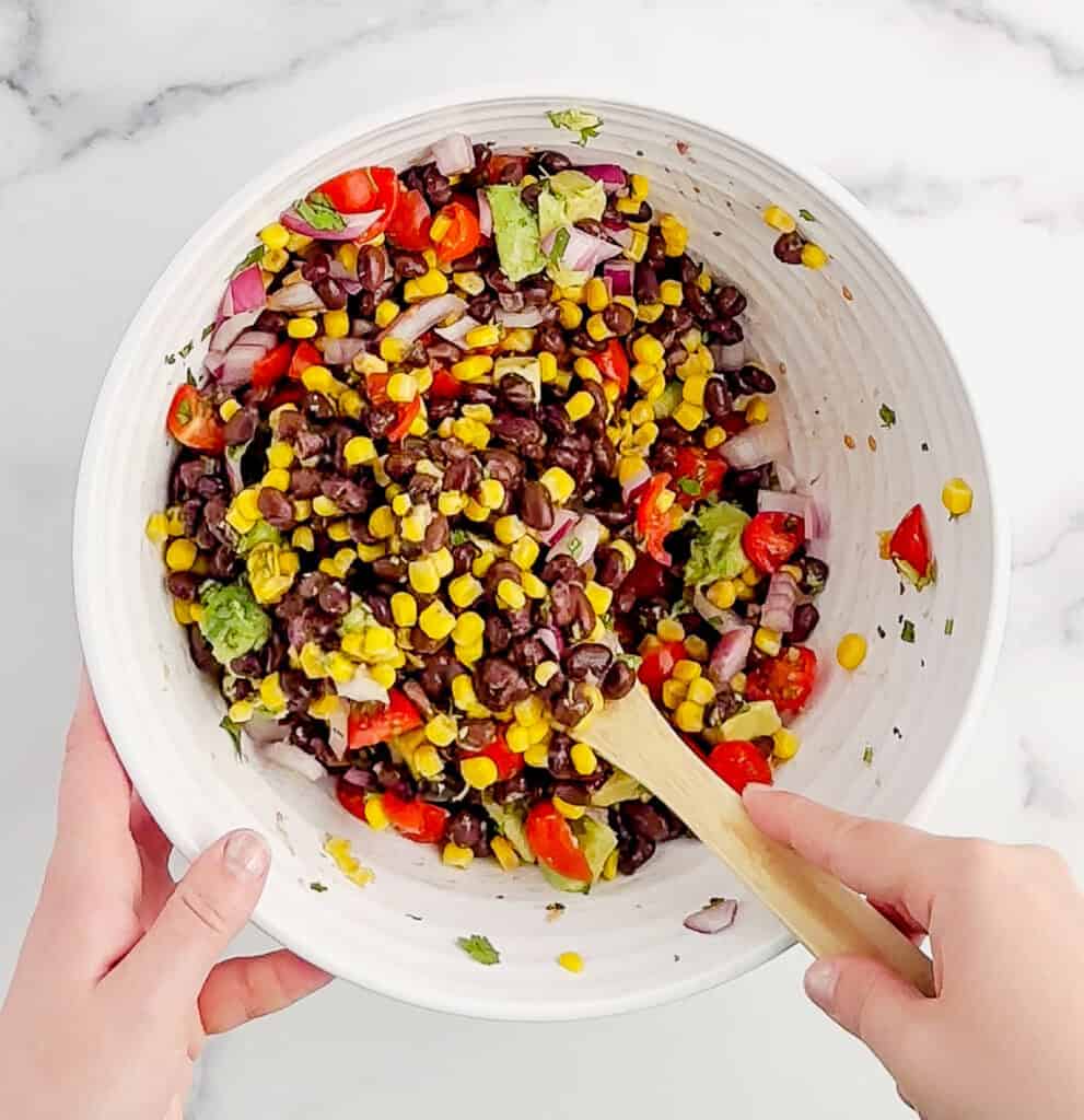 Combining All Ingredients for Black Bean Salad