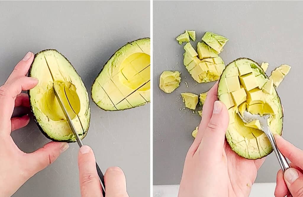 Chopping Avocado Into Small Chunks on Grey Cutting Board with Knife