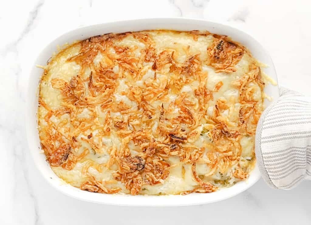 Cooked Cheesy Green Bean Casserole in Baking Dish