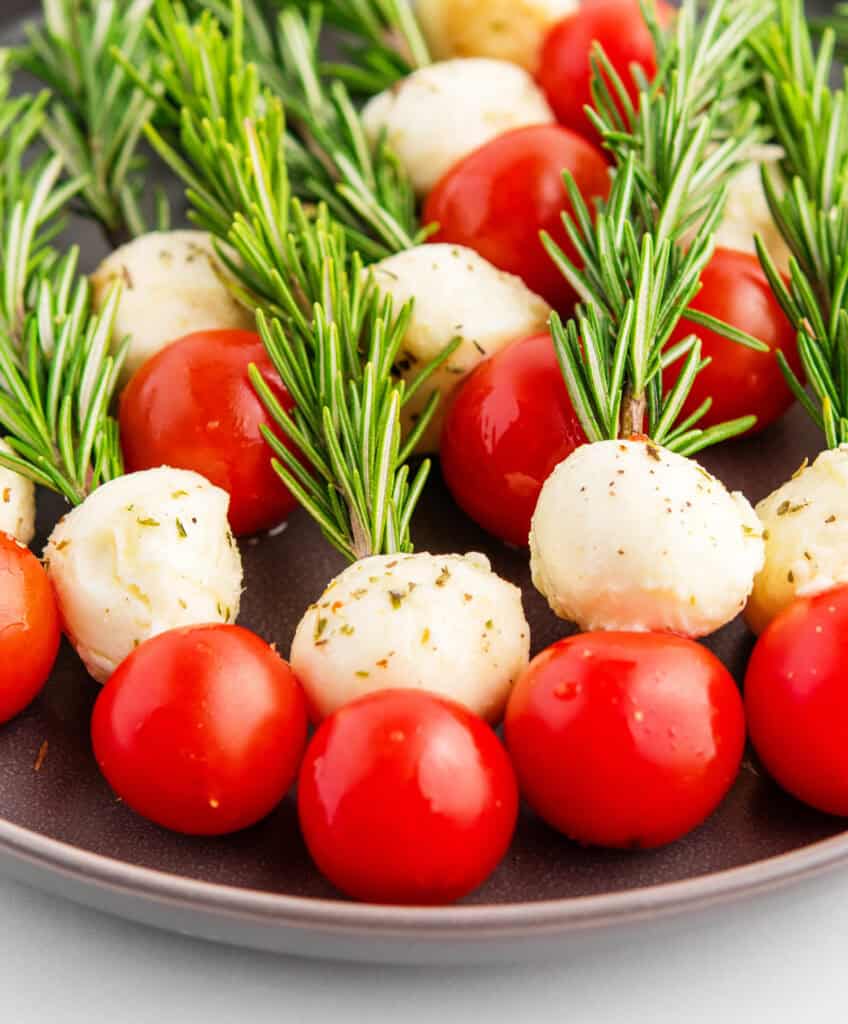 Arranging Caprese Skewers on Platter