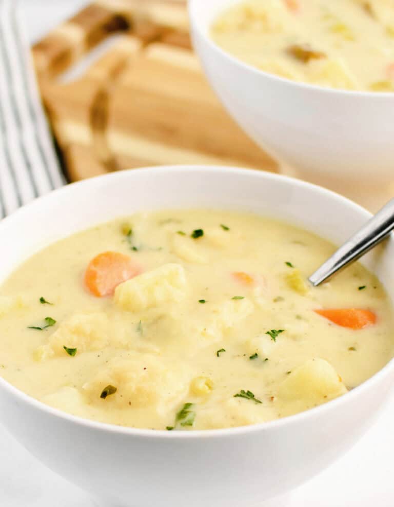 Knoephla Soup in Bowl with Spoon