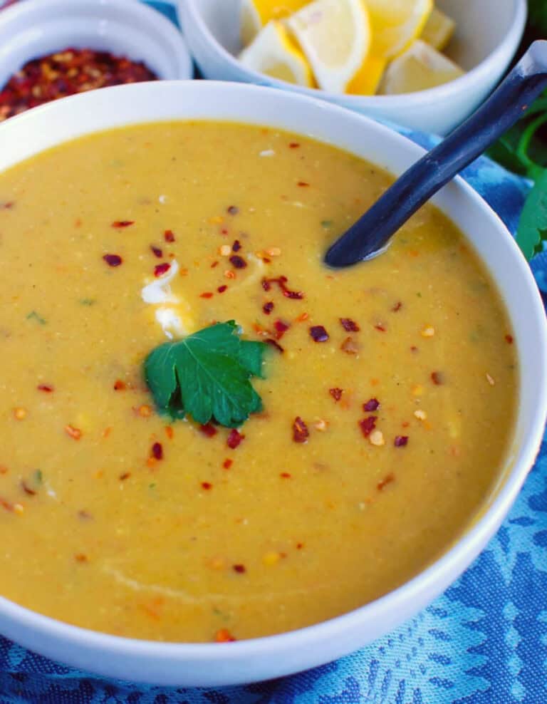 Lentil Soup in White Bowl with Spoon