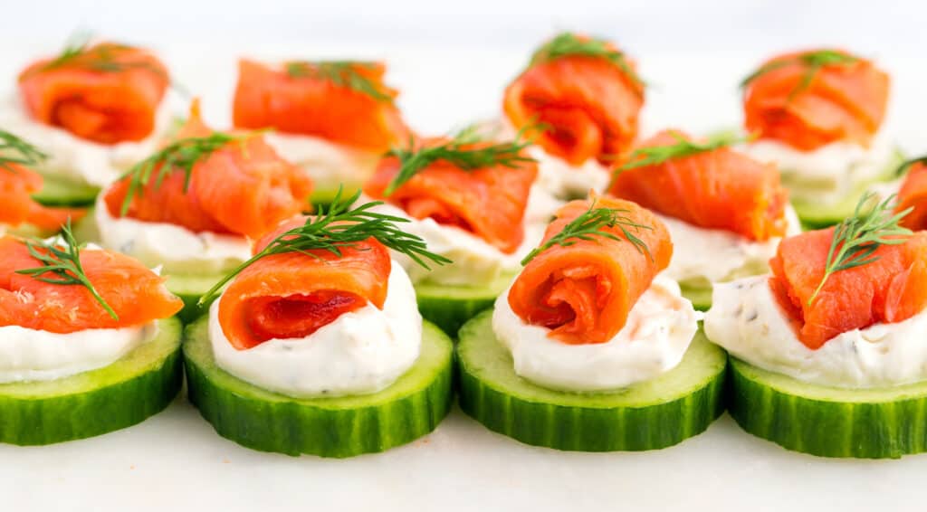 Cucumber Appetizers with Cream Cheese, Salmon, and Dill Garnish
