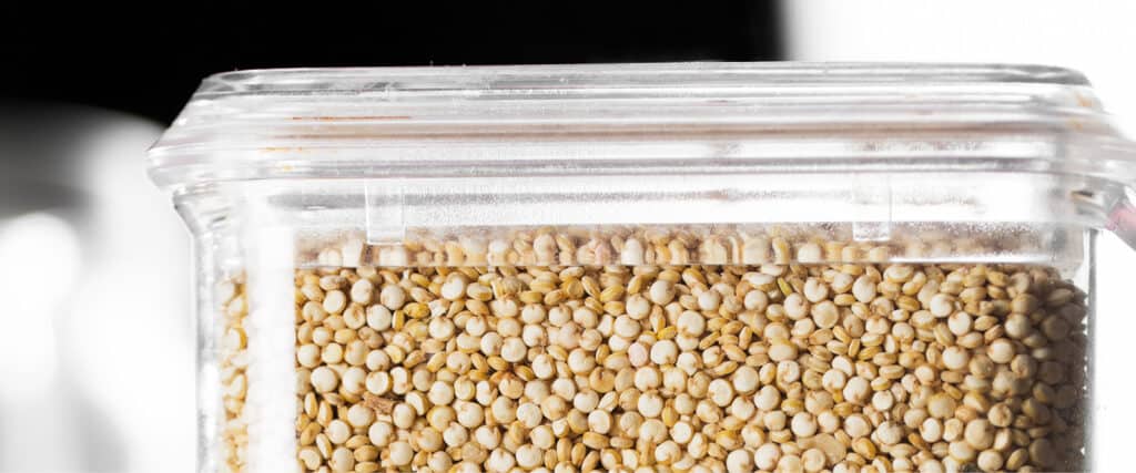 Raw Quinoa in a Glass Storage Container