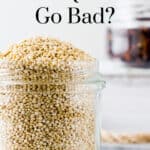 Raw Quinoa in Glass Jar with Quinoa on Countertop with Text Overlay Does Quinoa Go Bad Pin 4