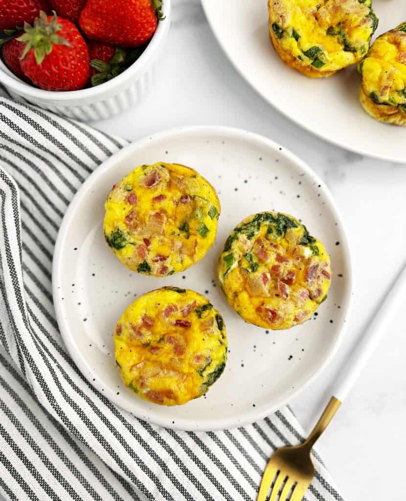Egg Bites on Speckled Plate with Fork and Napkin