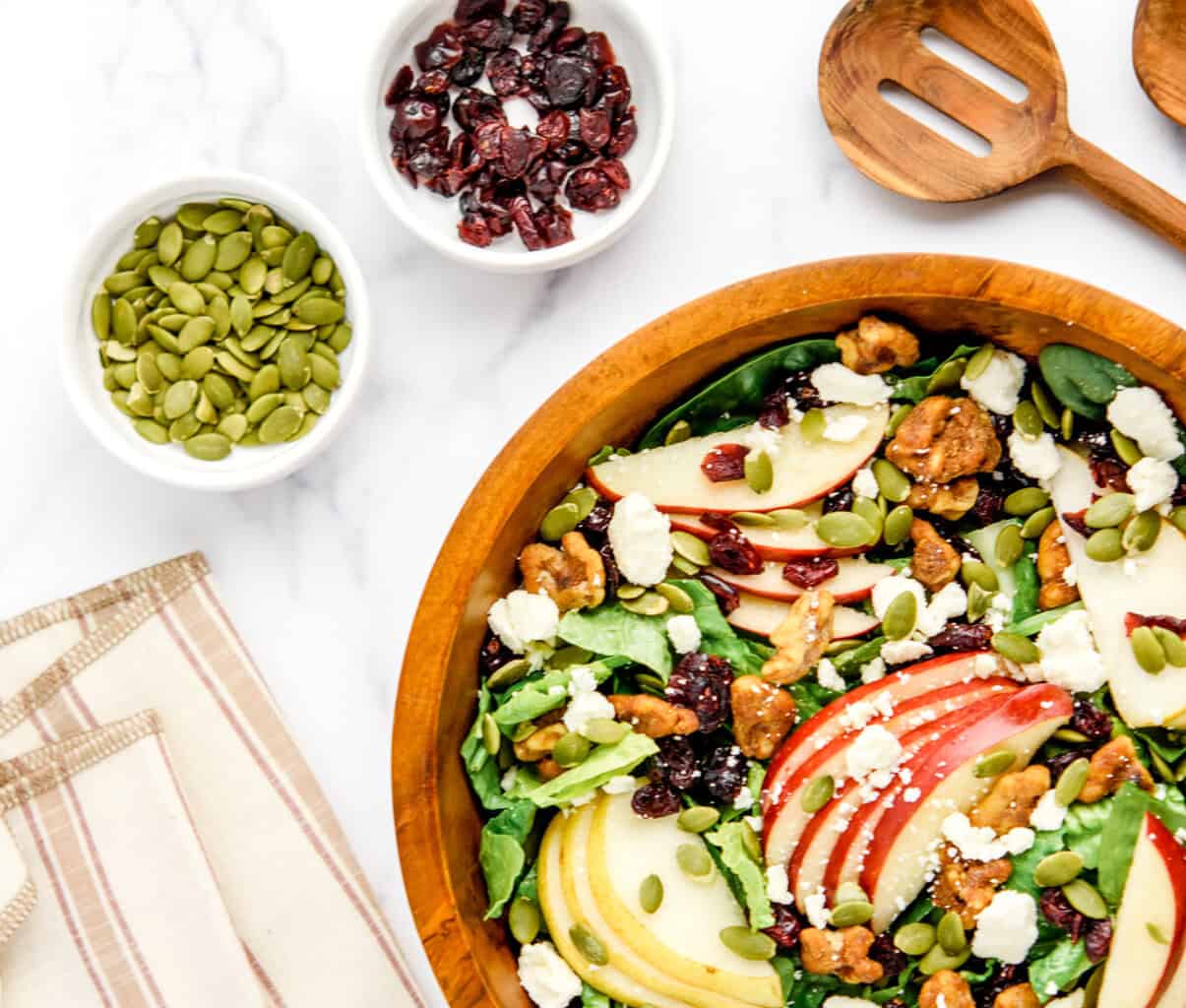 Fall Harvest Salad in Wooden Bowl with Wooden Spoon