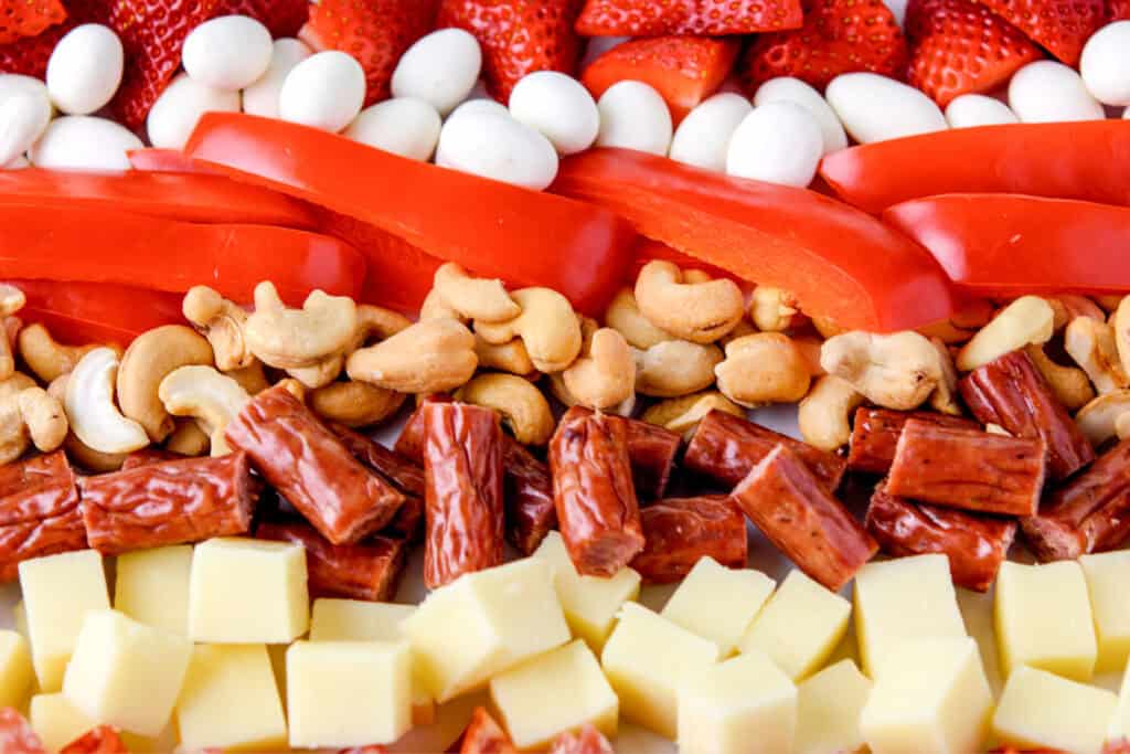 Close Up of Red and White Snacks in Rows for Stripes