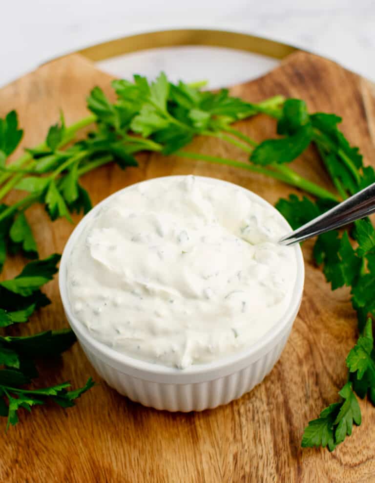 Green Goddess Dip on Wooden Surface with Parsley