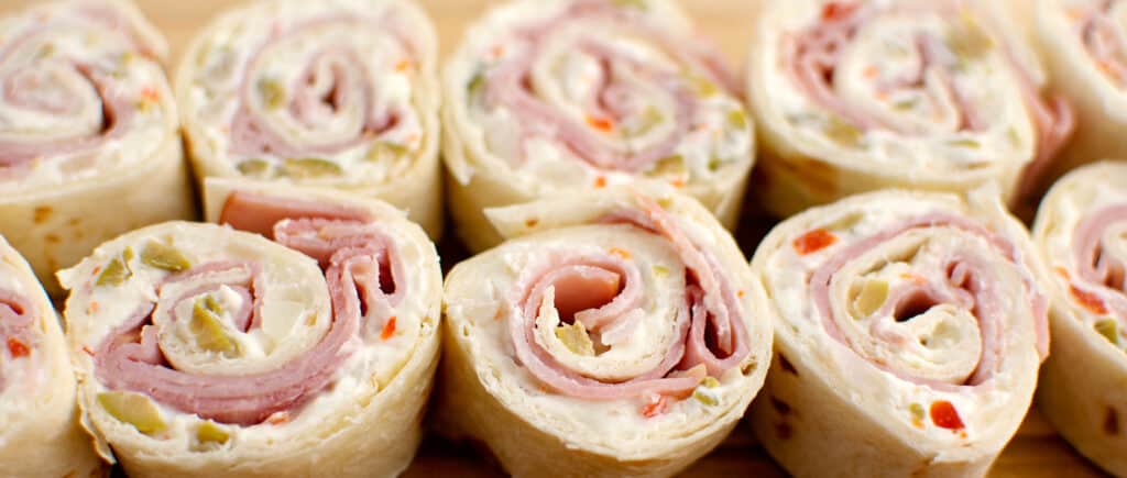 Close Up of Green Olive, Ham and Cream Cheese Pinwheels