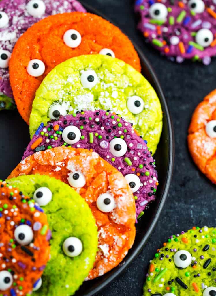Green, Orange, and Purple Cookies with Sprinkles and Candy Eyeballs