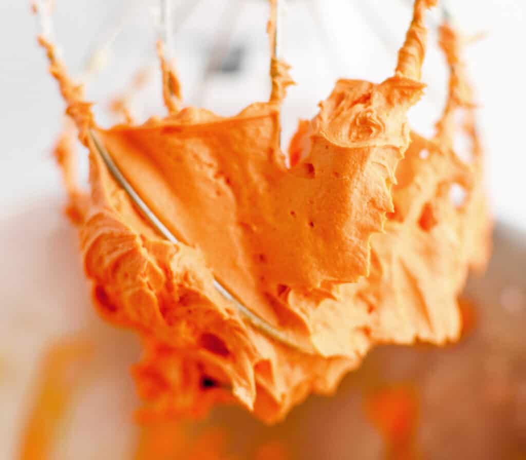 Orange Frosting on Stand Mixer Whisk