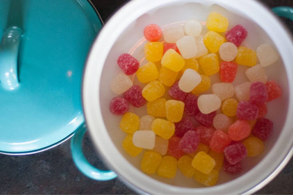 Spiced Gum Drops in Teal Bowl with Lid to the Side