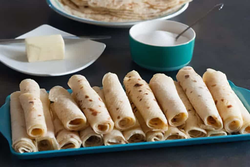 Lefse Rolled Up with Butter and Sugar on Serving Tray