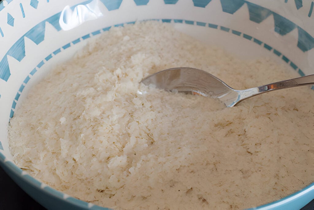 Mixing Lefse Ingredients in Bowl with Spoon