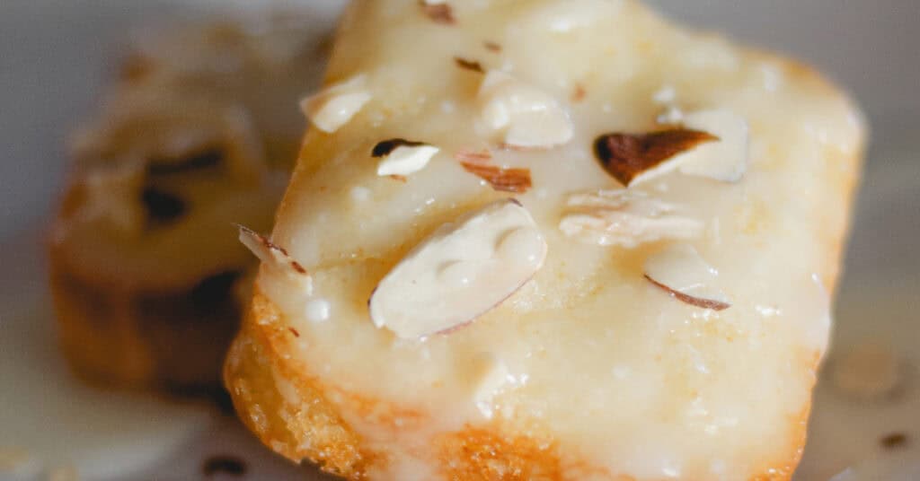 Mini Almond Cakes with Almonds and Glaze