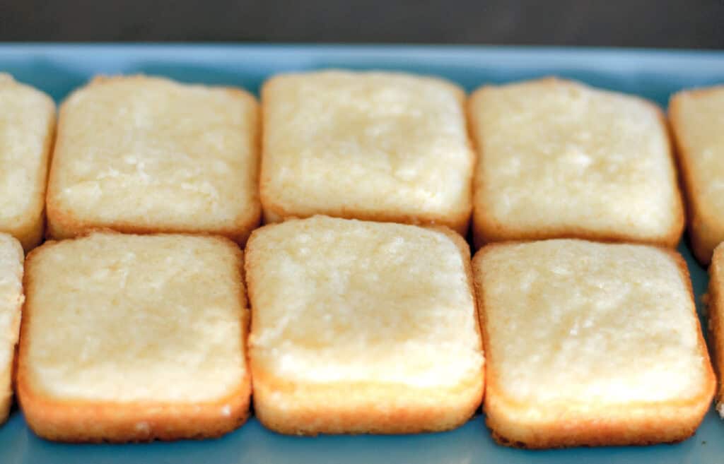 Almond Cakes on Serving Tray Before Toppings