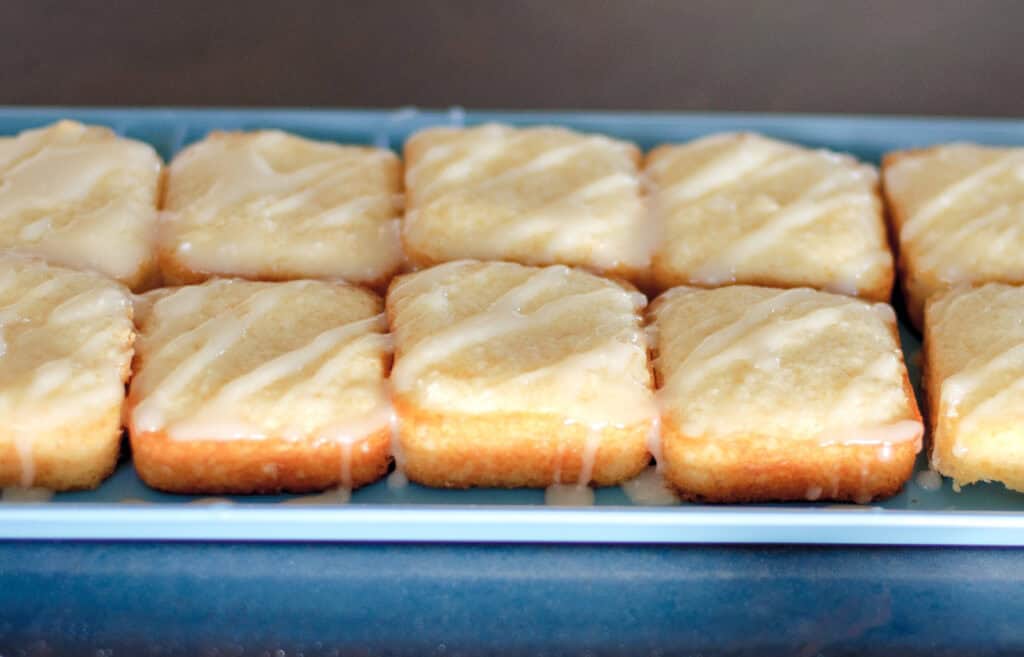 Almonds Cakes on Serving Tray with Glaze Added