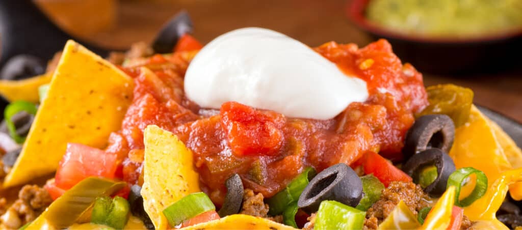 Salsa on Nachos with Sour Cream and Other Toppings