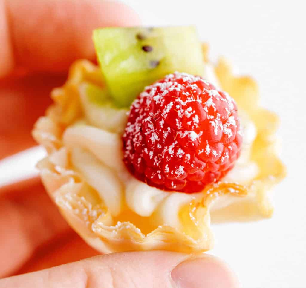 Closeup of Cheesecake Bite in Phyllo Shell with Fruit