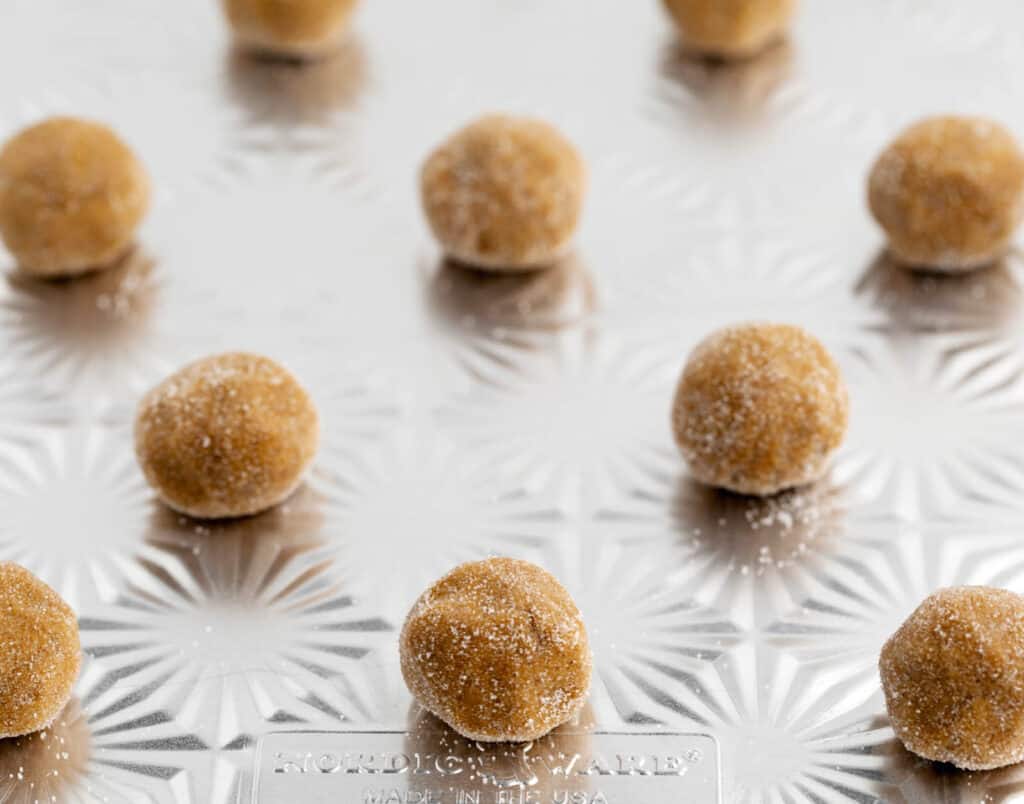 Rolled Dough Balls on Cookie Sheet Close Up