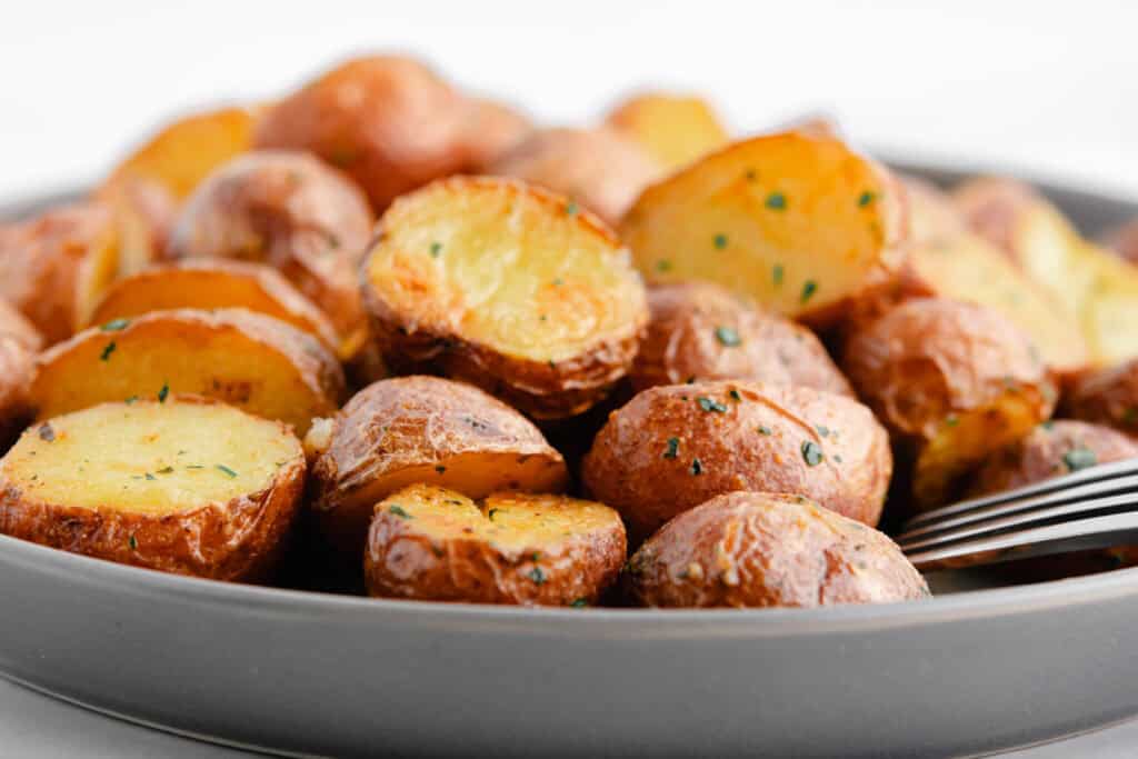 Side View Roasted Potatoes on Plate