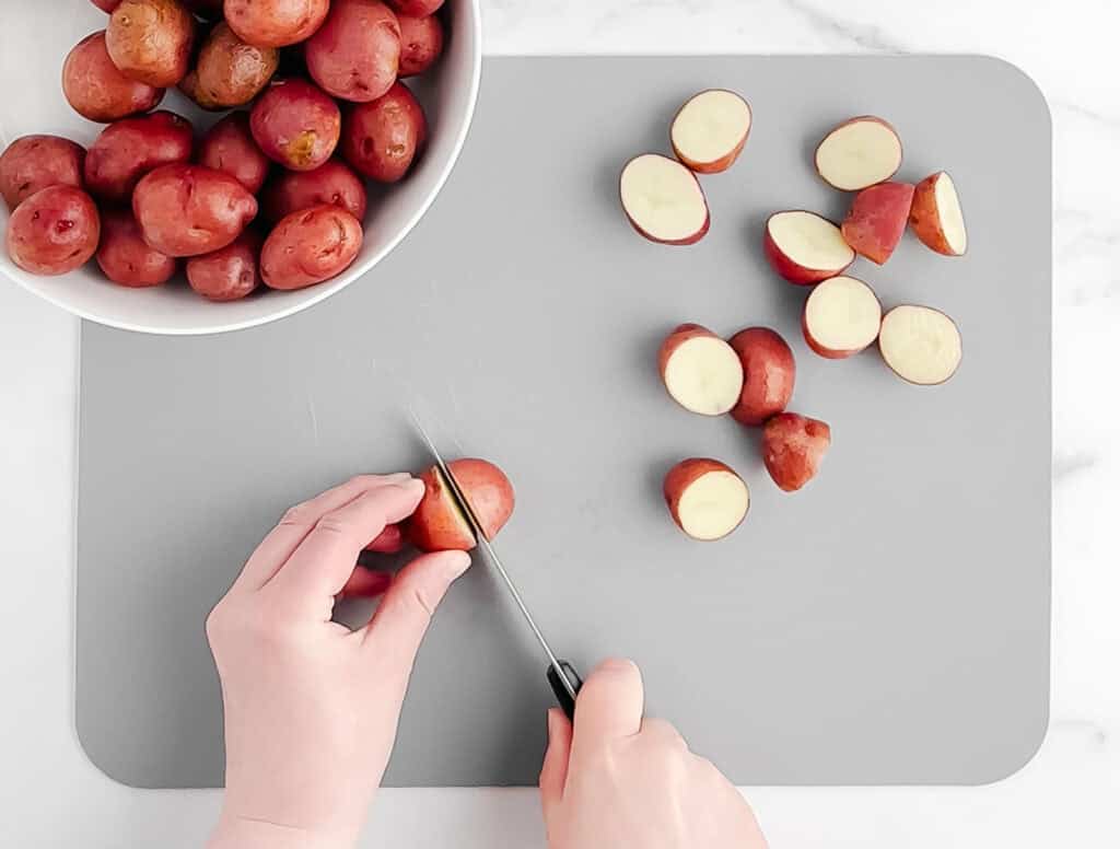 Cutting Potatoes on Grey Cutting Board