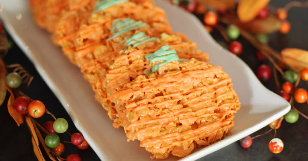 Pumpkin Corn Flake Treats on White Serving Platter