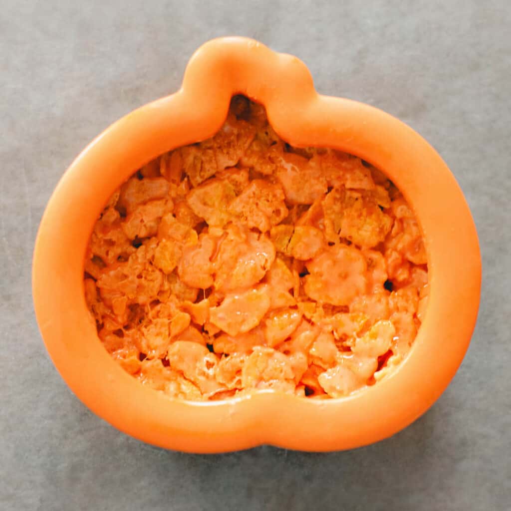 Pumpkin Cookie Cutter with Corn Flake Mixture