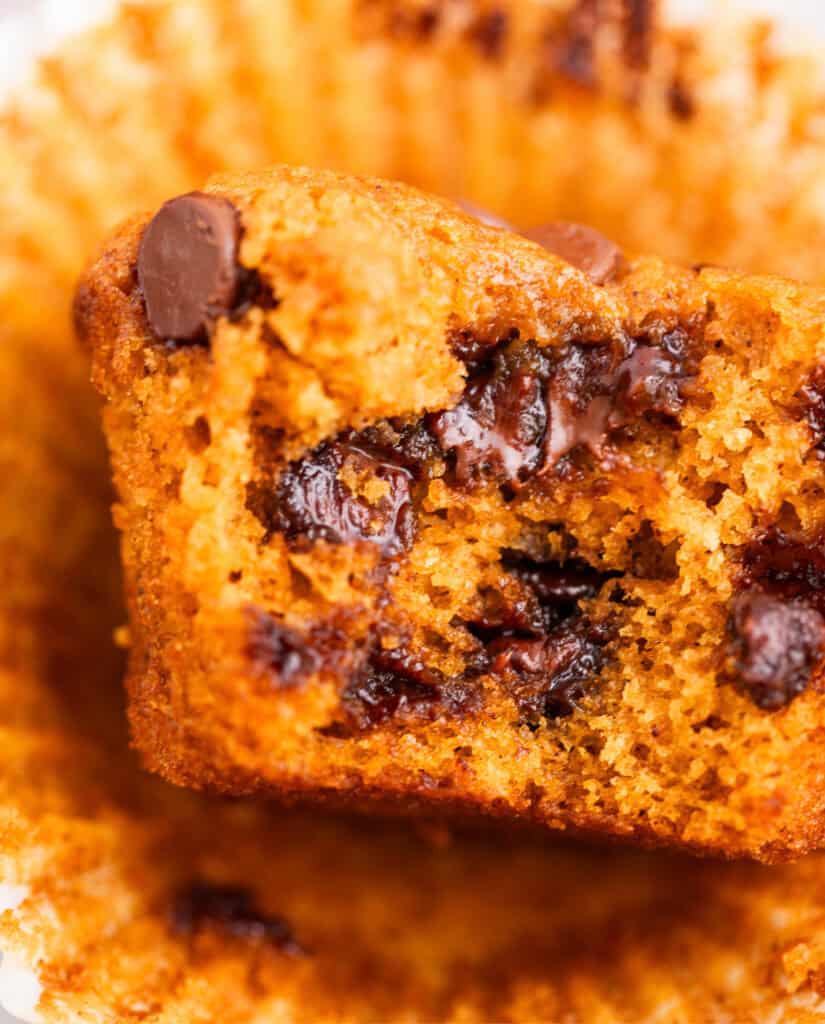 Pumpkin Chocolate Chip Muffin Cut Open on Wrapper