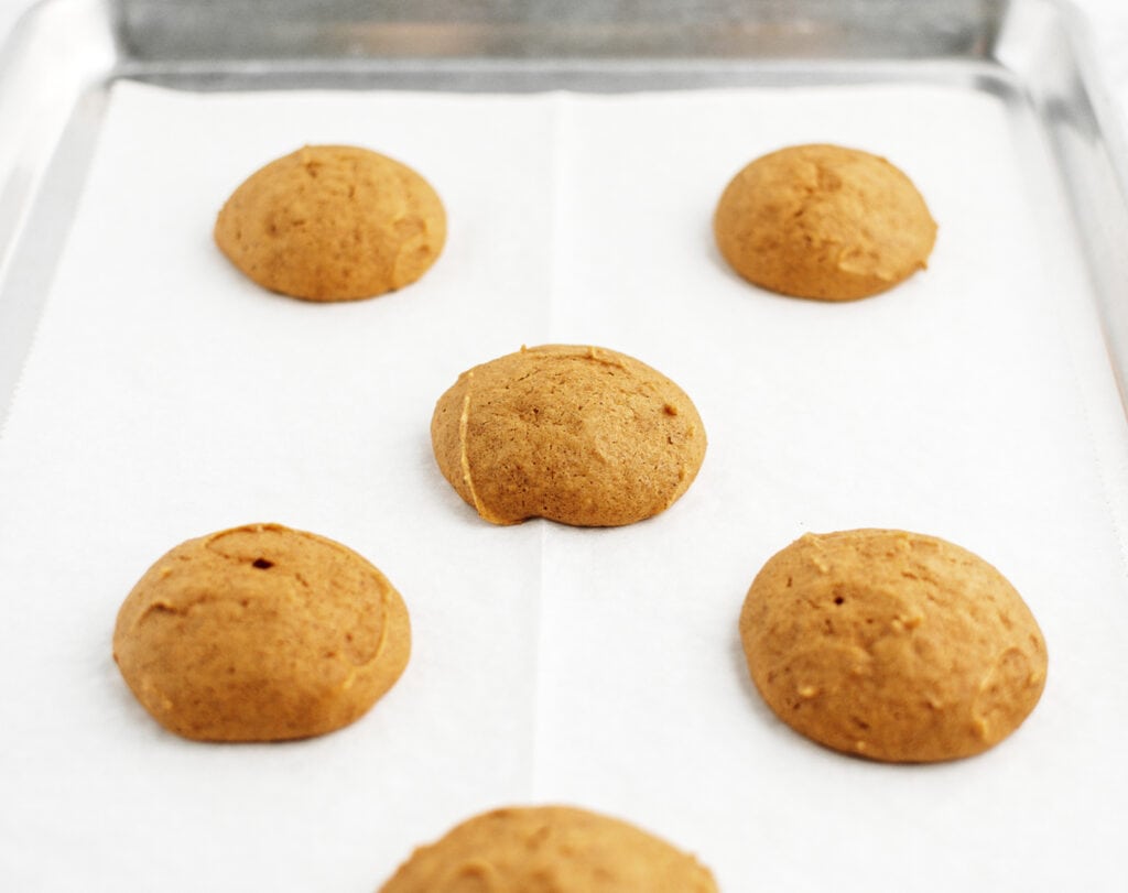 Baked Cookies on Parchment Lined Baking Sheet