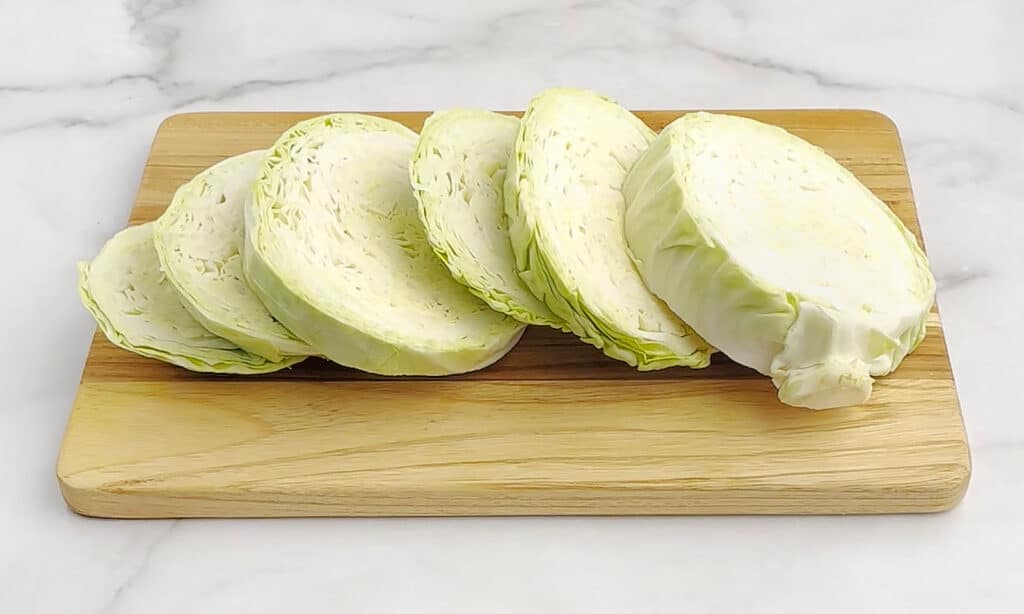 Slices of Cabbage on Cutting Board