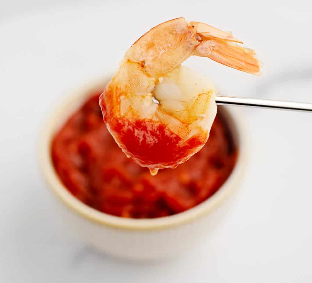 Shrimp Fondue Dipped in Cocktail Sauce