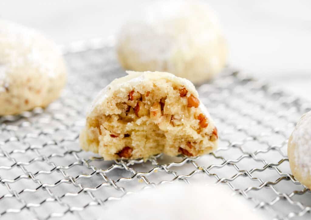 Snowball Cookie Inside on Pan with More Snowball Cookies