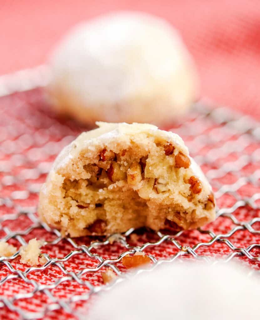 Snowball Cookies on Cooling Rack on Red Towel