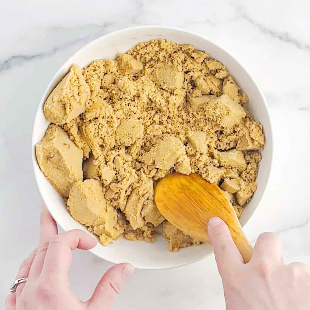 Stirring Brown Sugar with a Wooden Spoon