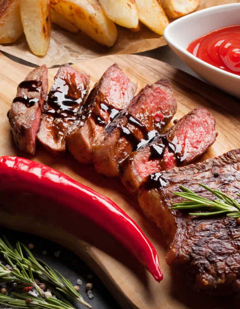 Steak with Sauce Topping and Herbs