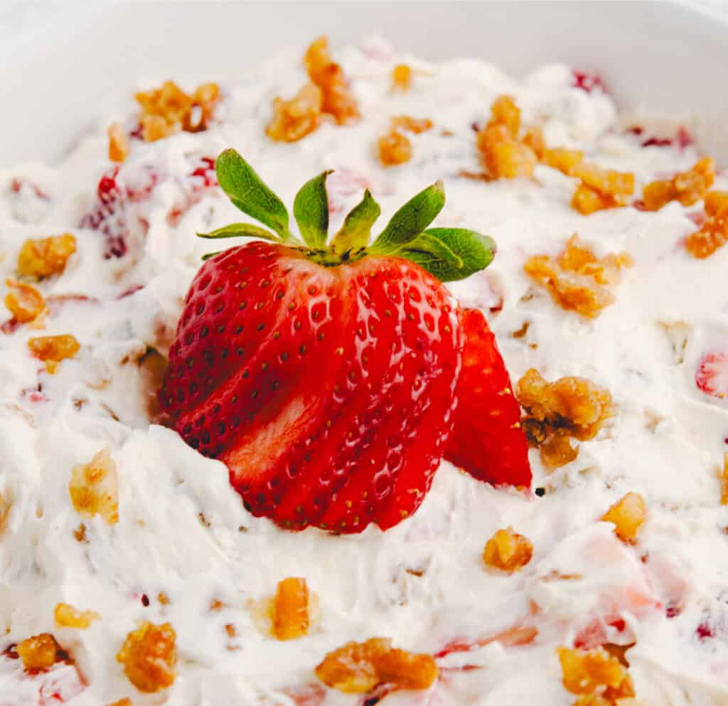 Strawberry Pretzel Salad in a Bowl Closeup