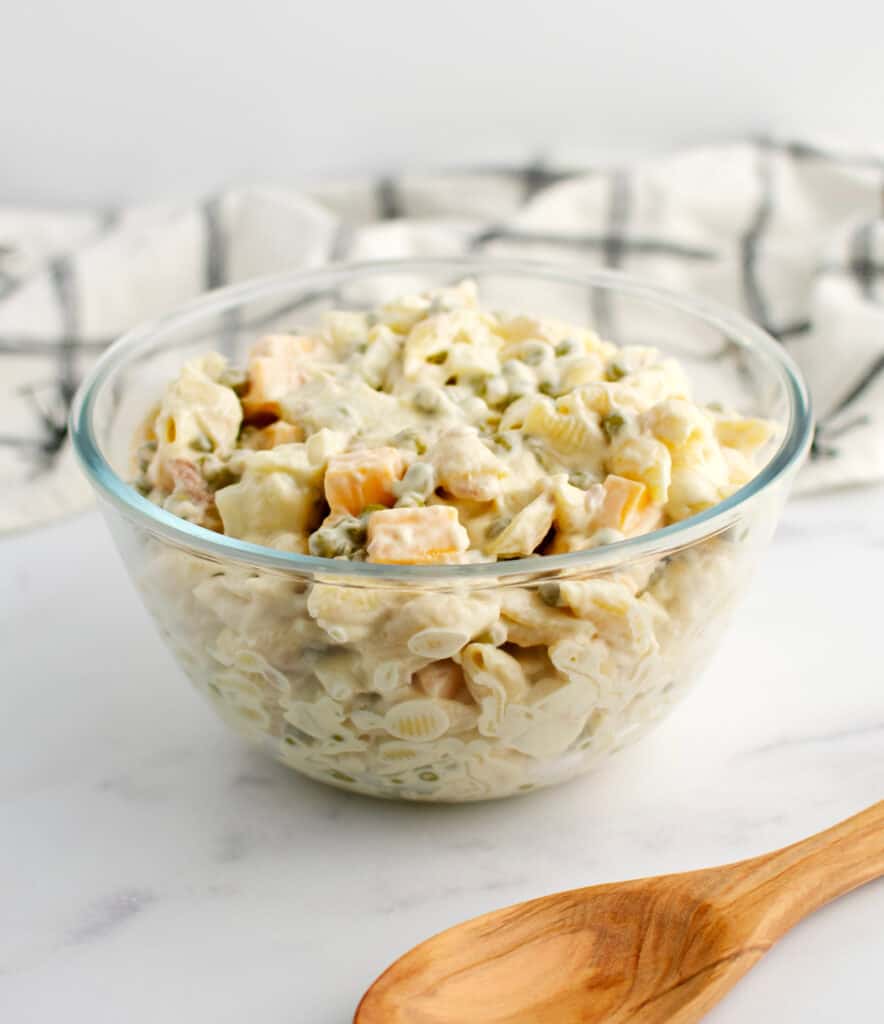 Pasta Salad with Tuna in Glass Bowl with Wooden Spoon