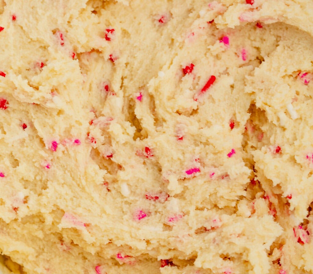 Red and Pink Sprinkles in Sugar Cookie Dough